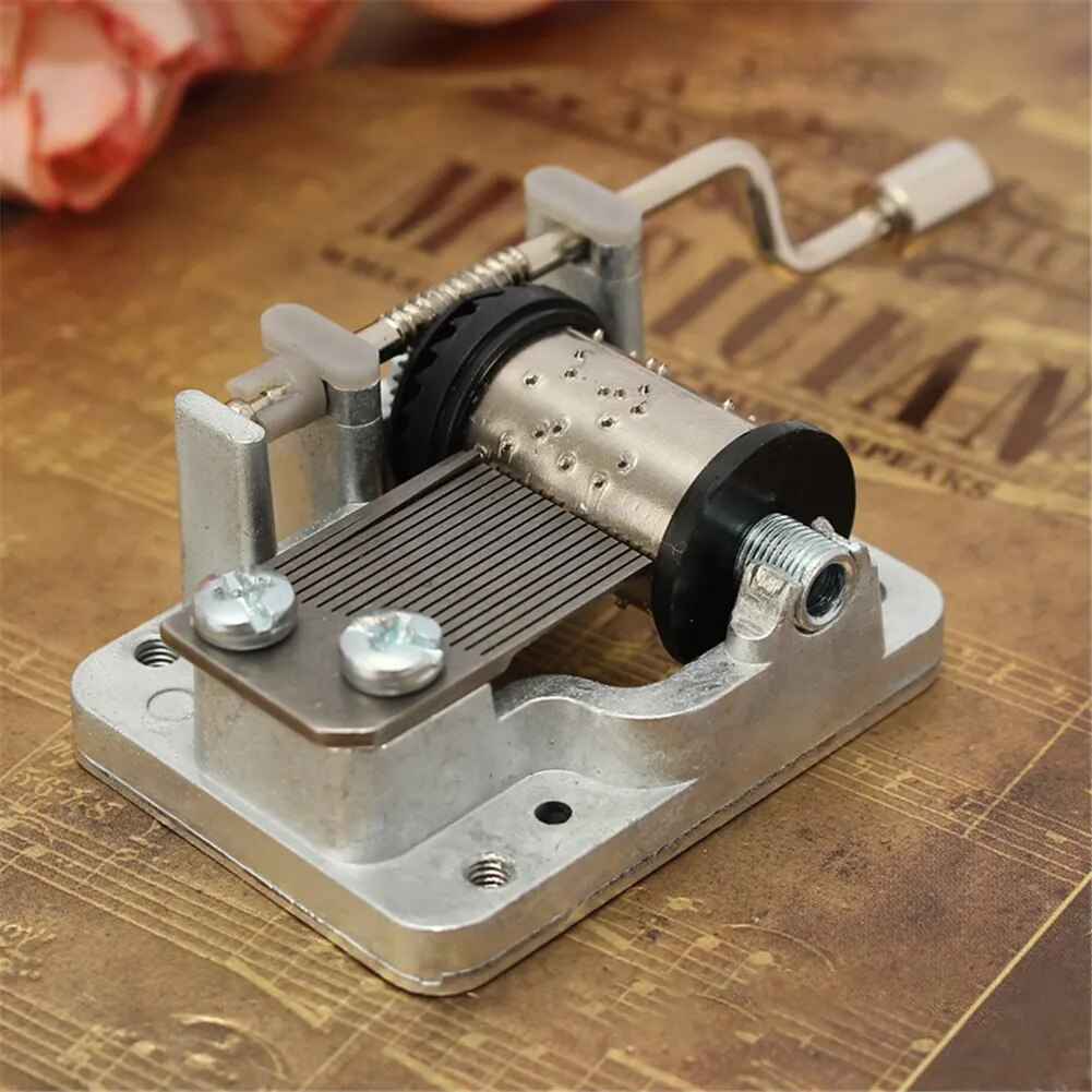 mécanisme à manivelle pour boite à musique